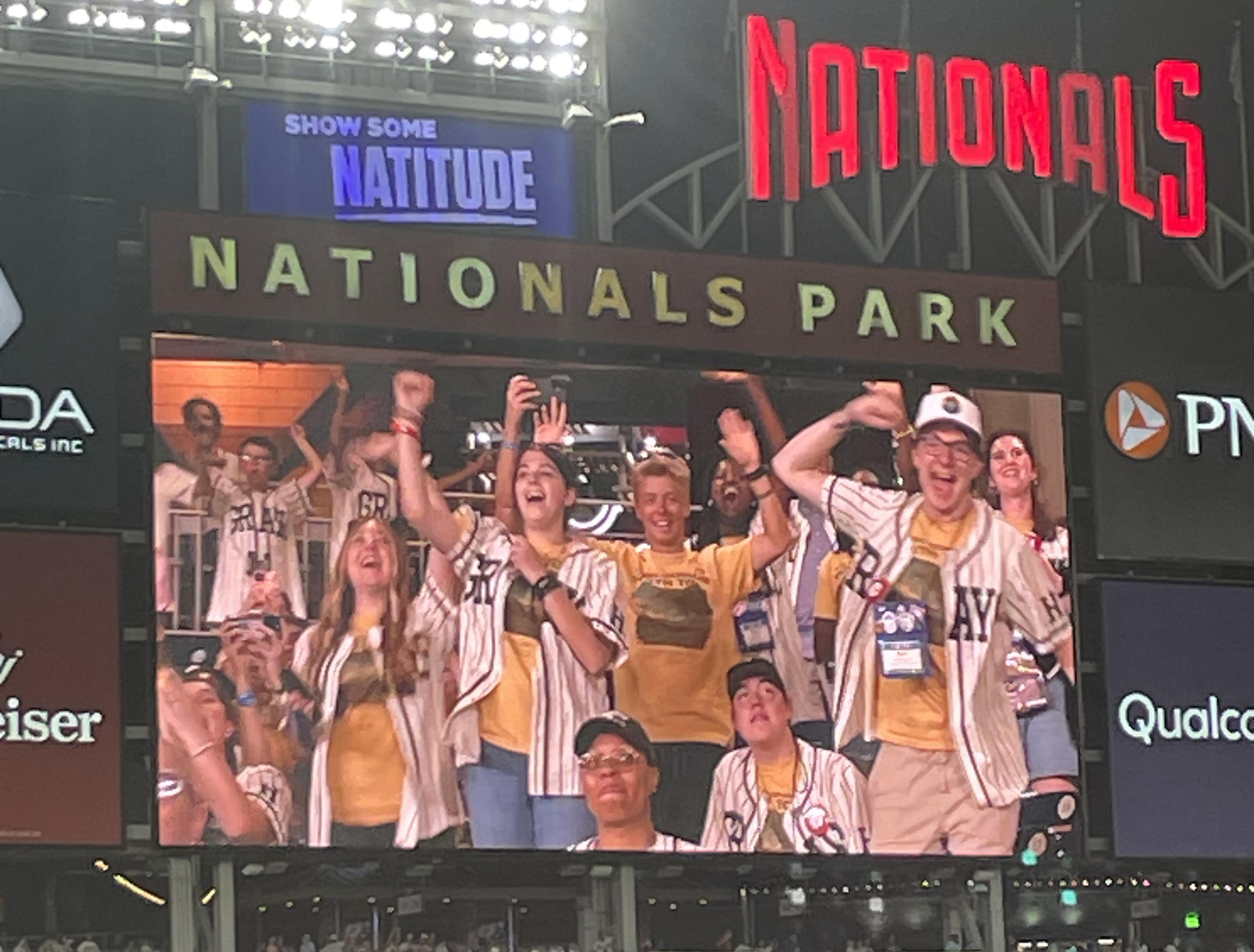 Youth Tour participants at the Washington Nationals baseball game on the video screen